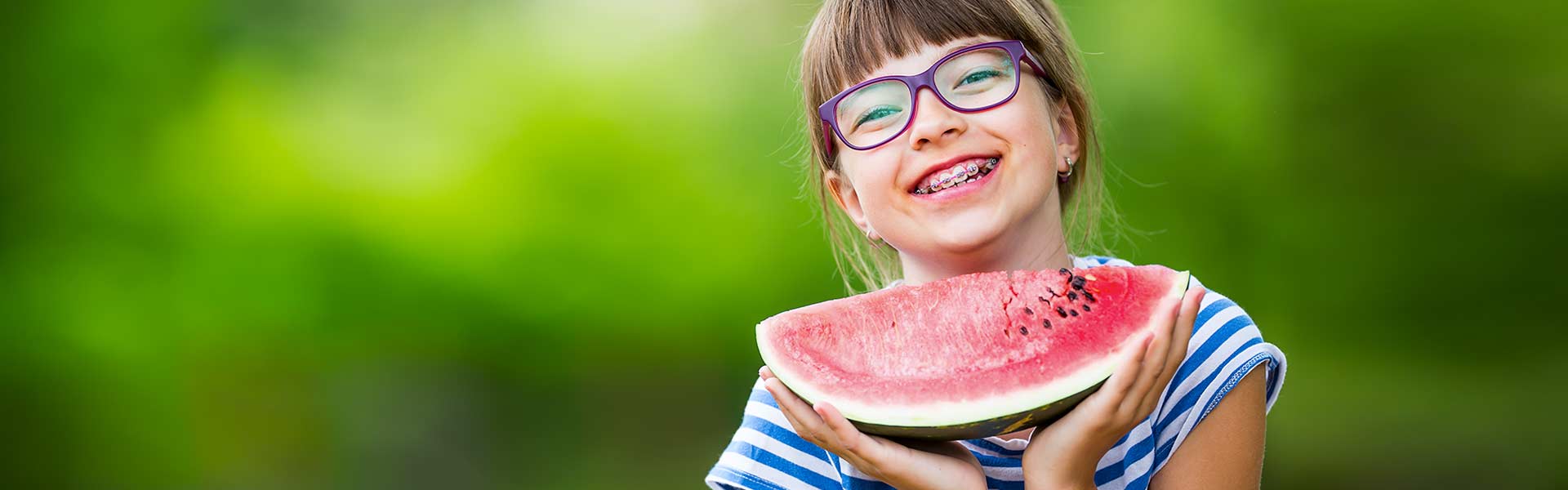 Slider girl Braces Watermelon Nelson Pediatric Dentistry & Orthodontics in Portland, OR